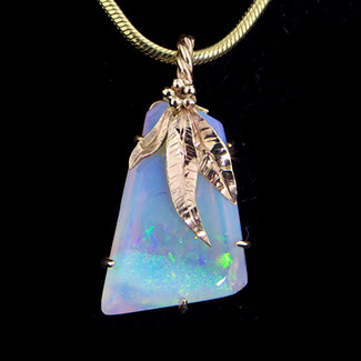 Gold pendant set with an Australian opal